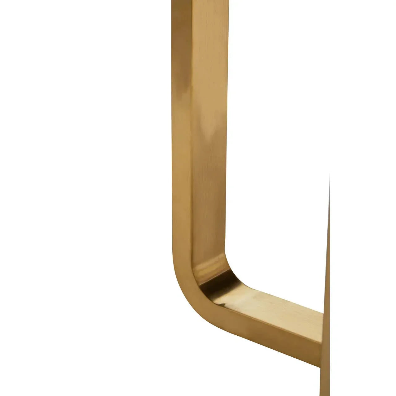 Gold metal table leg with curved base detail against white background