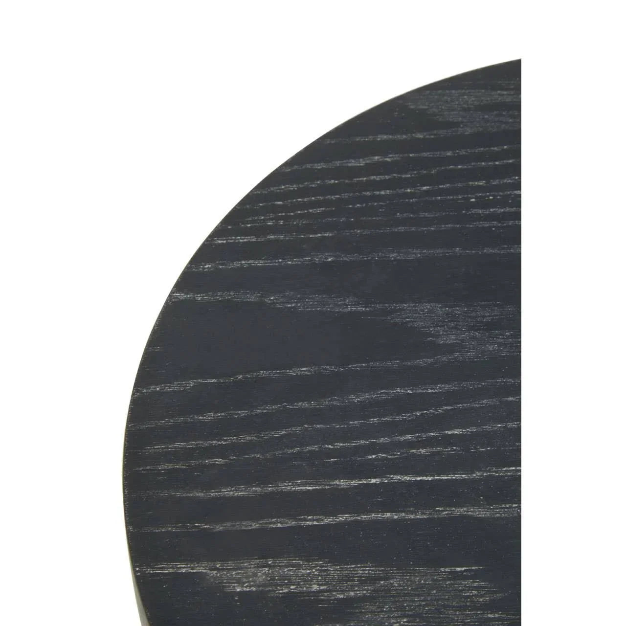 Close-up of round black wood table top with visible natural grain texture