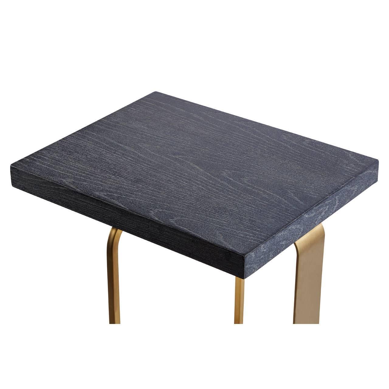 Black wood side table with gold metal legs, close up of tabletop and corner angle