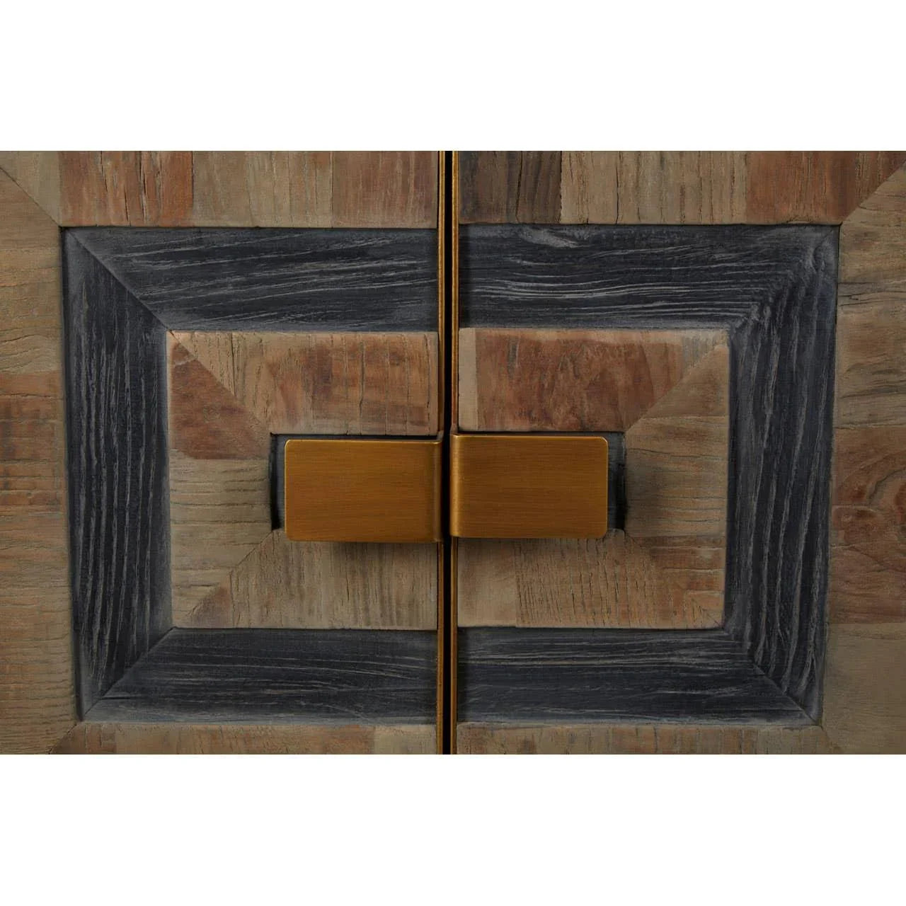 Closeup of geometric wooden cabinet doors with brass handles and wood grain texture