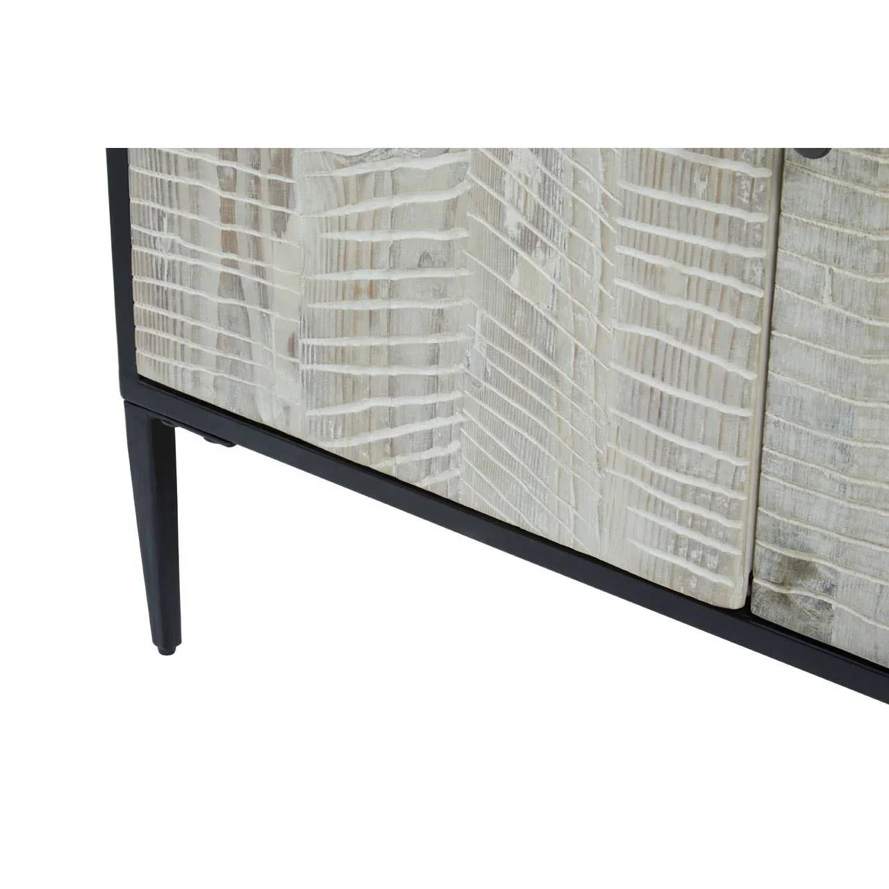 Textured wood sideboard with carved front panel and black metal legs, close-up view