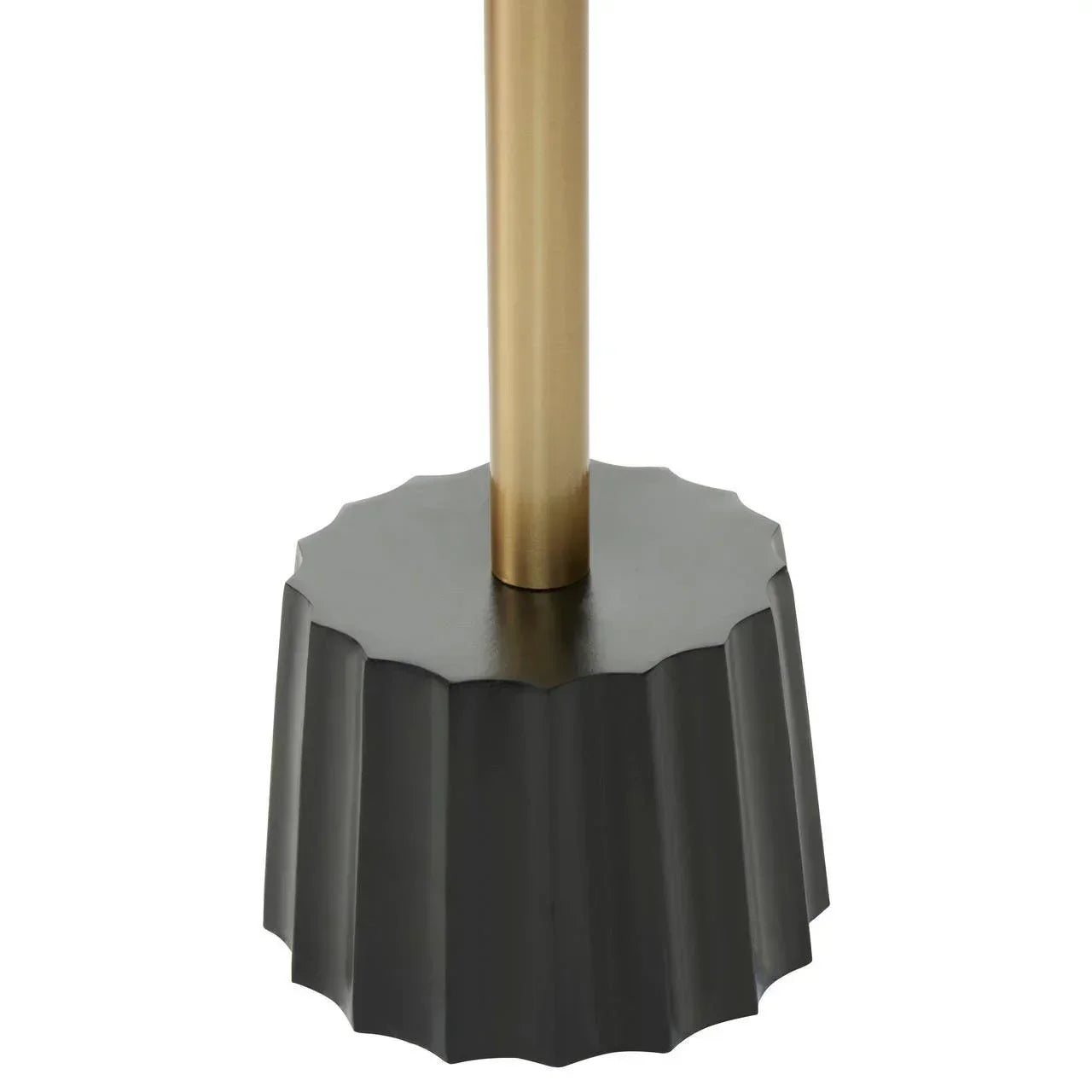 Black fluted lamp base with gold metal stem closeup