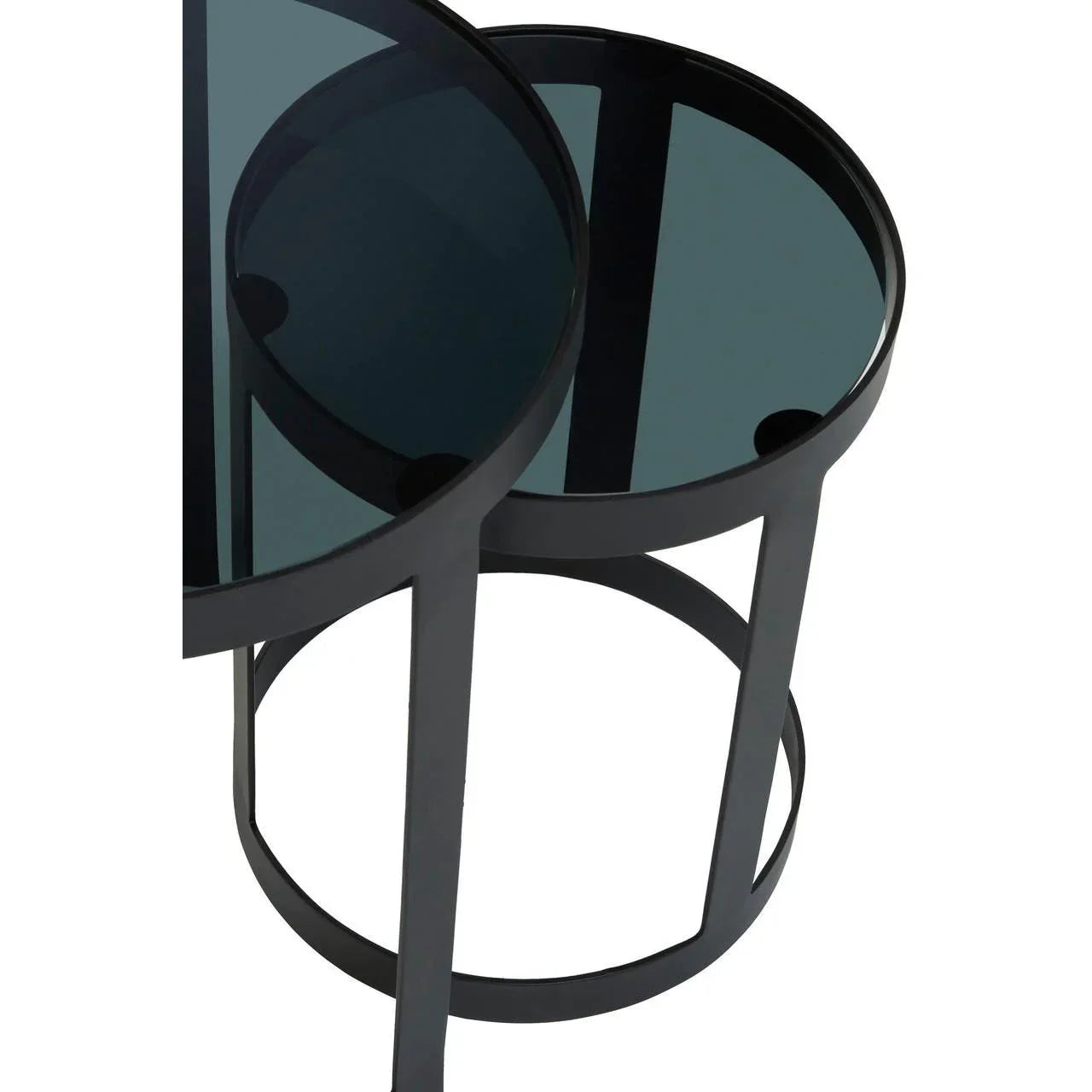 Black glass nest of tables with round tops and metal frames, angled close-up view