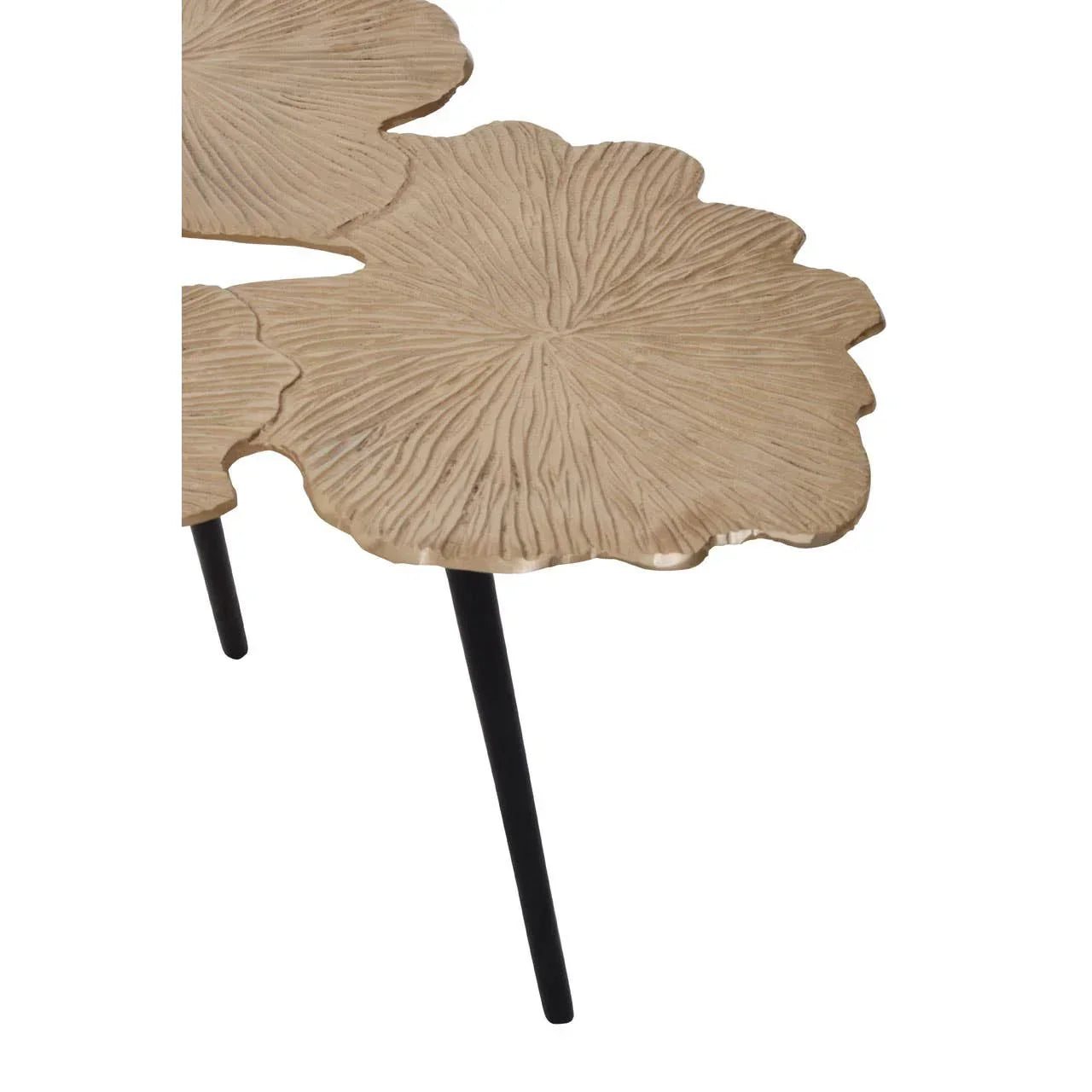 Gold metal side table with textured leaf-shaped top and slim black legs