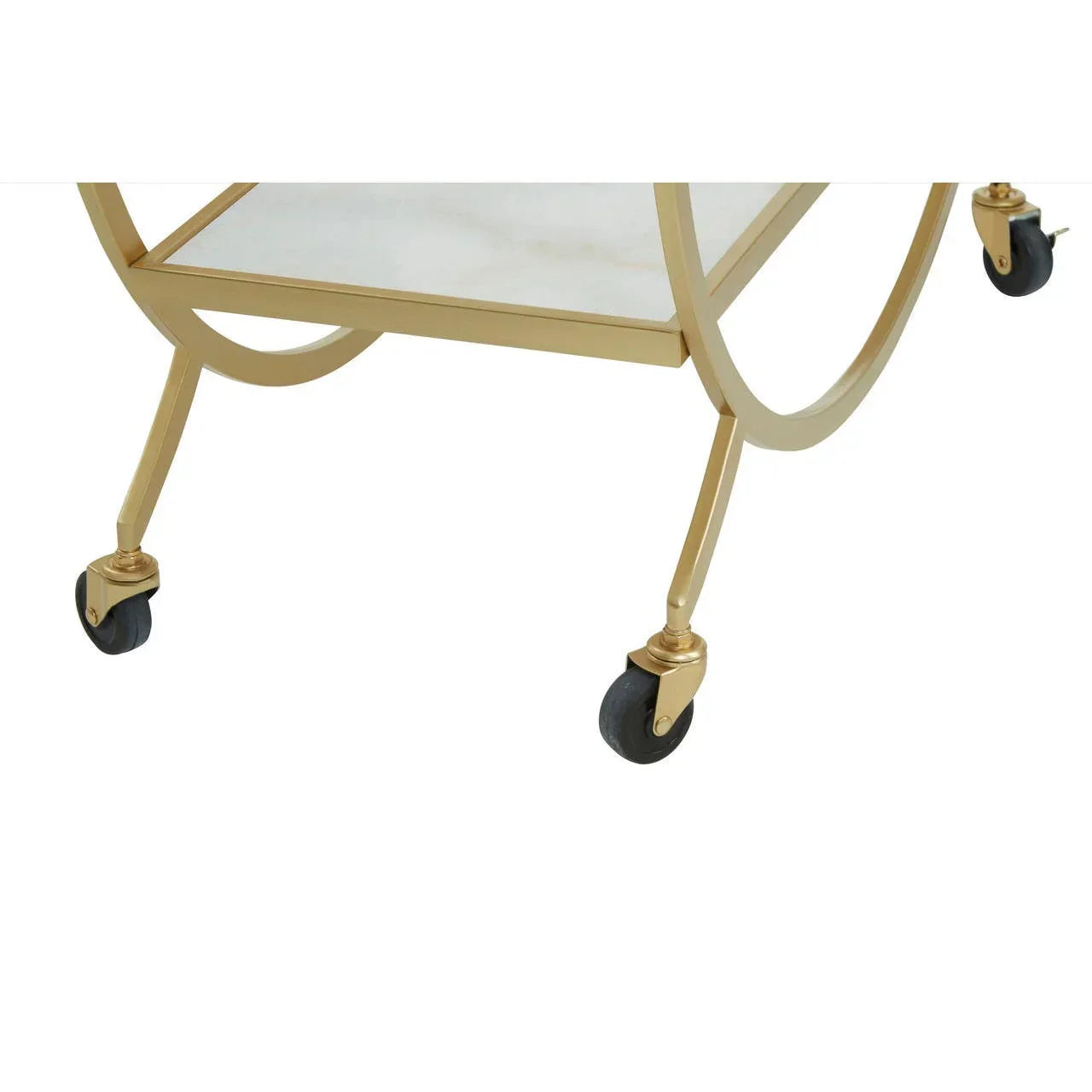Gold metal bar cart with round legs and white marble shelf, close-up of caster wheels