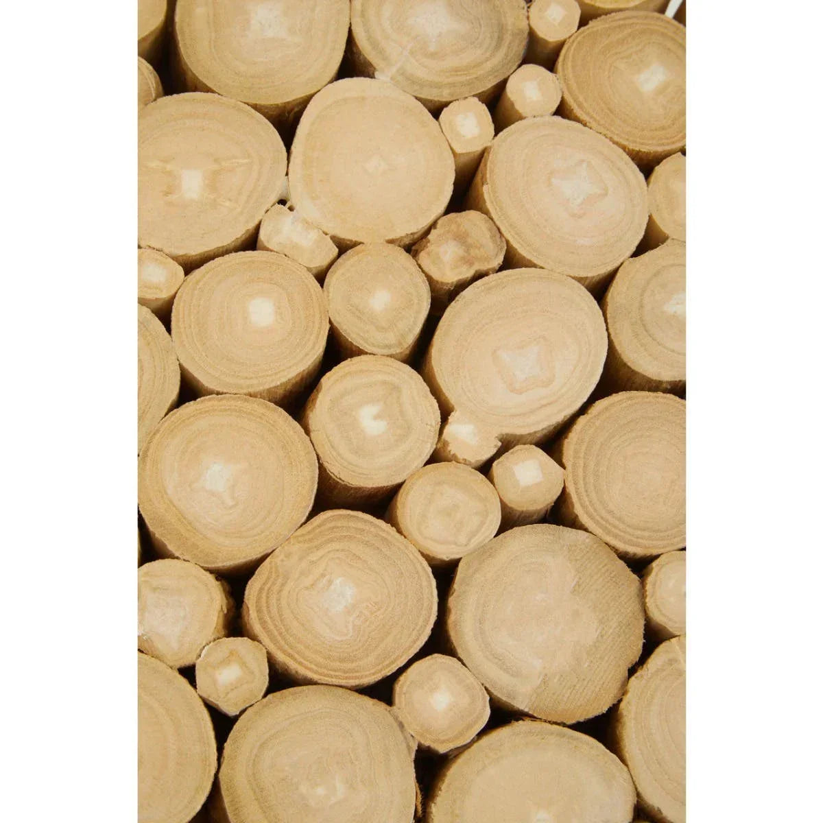 Closeup of natural wood logs with visible rings and smooth cut ends