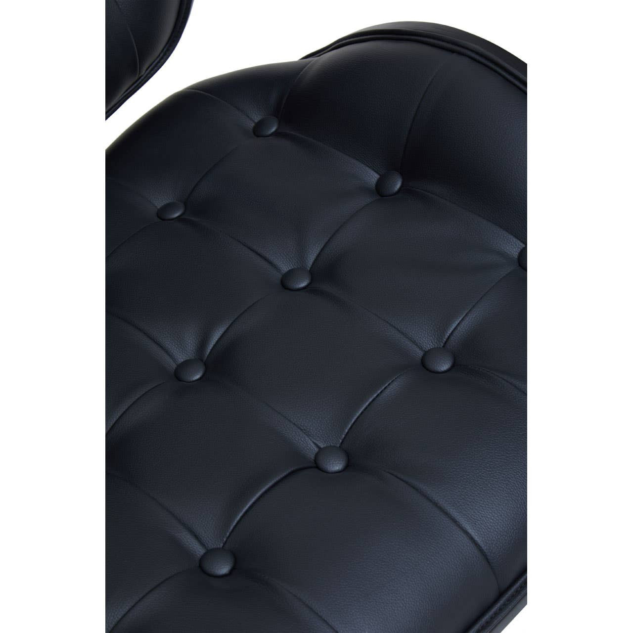 Black leather effect chair featuring a tufted design with round buttons, showcasing a sleek and modern aesthetic.
