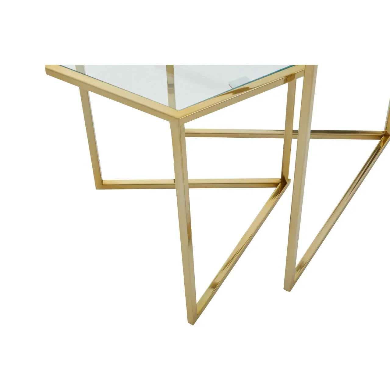 Glass side table with gold metal frame, close-up showing modern geometric base design