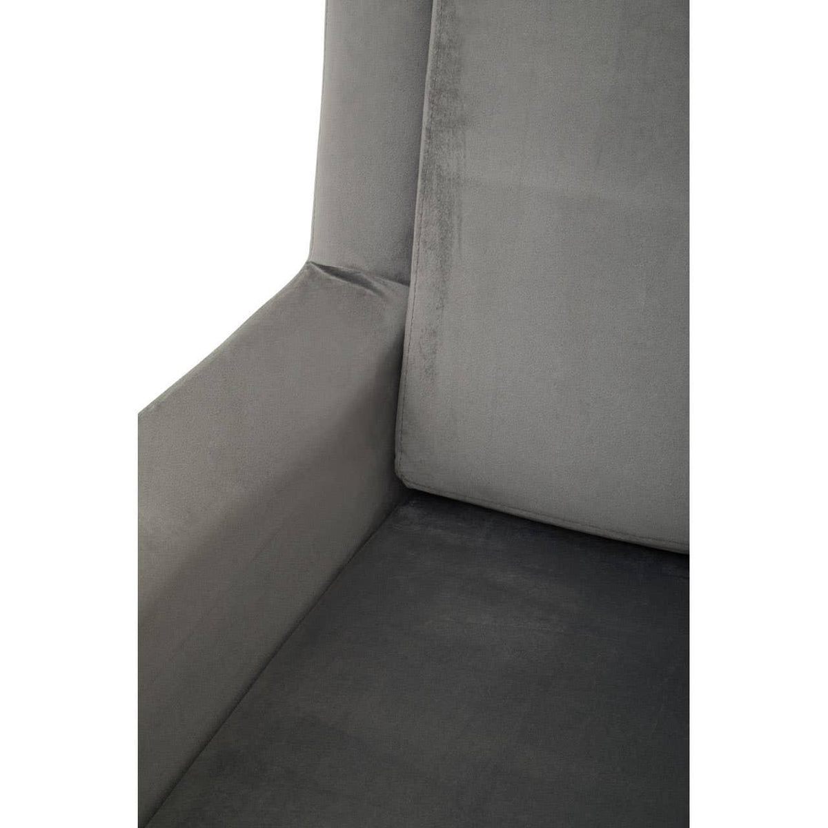 Close-up of grey velvet armchair cushion and seat upholstery