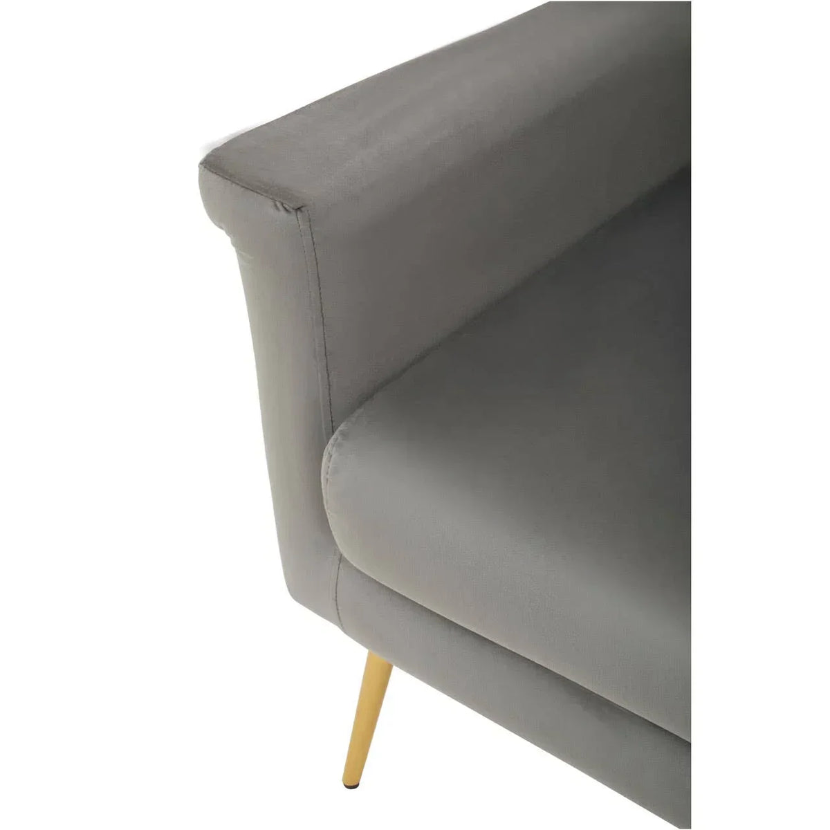 Close view of grey fabric sofa armrest with gold metal leg
