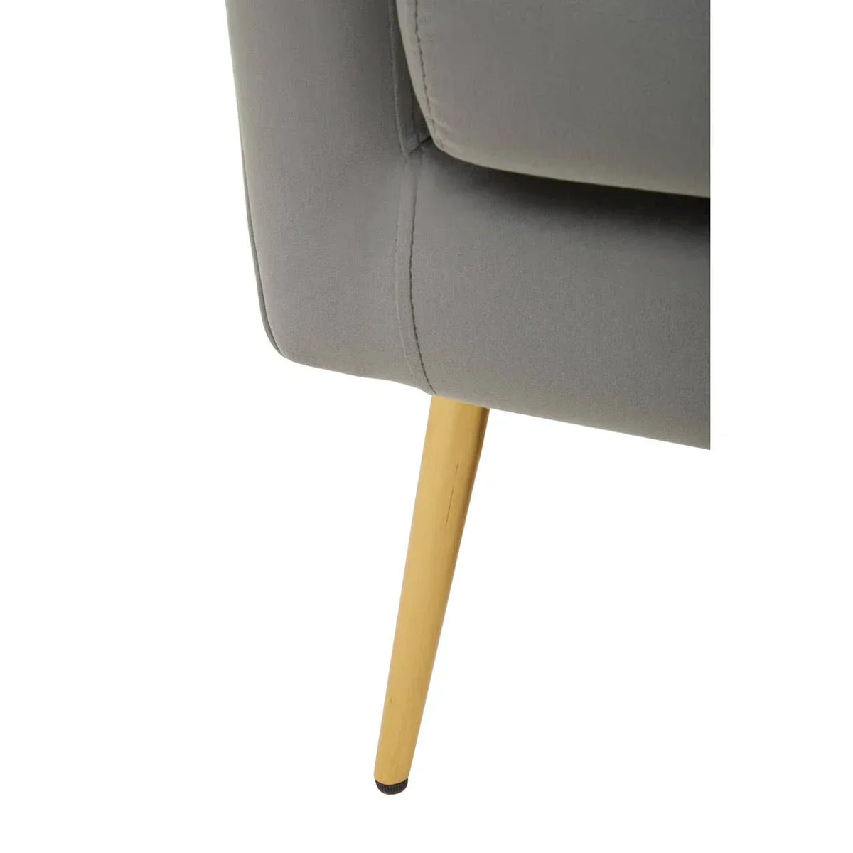 Closeup of grey sofa corner with light wooden tapered leg