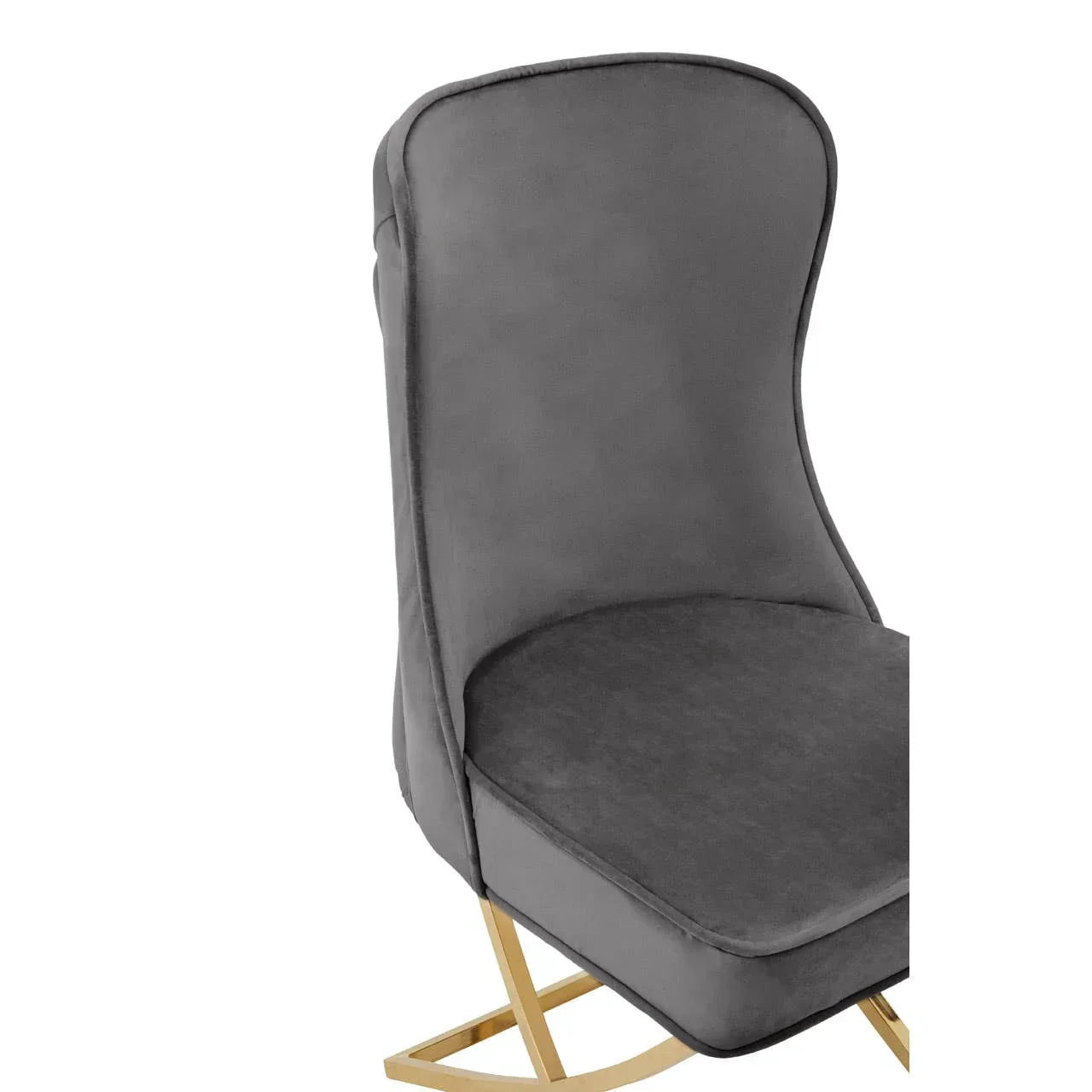 Grey velvet accent chair with high back and gold metal legs, side angle view