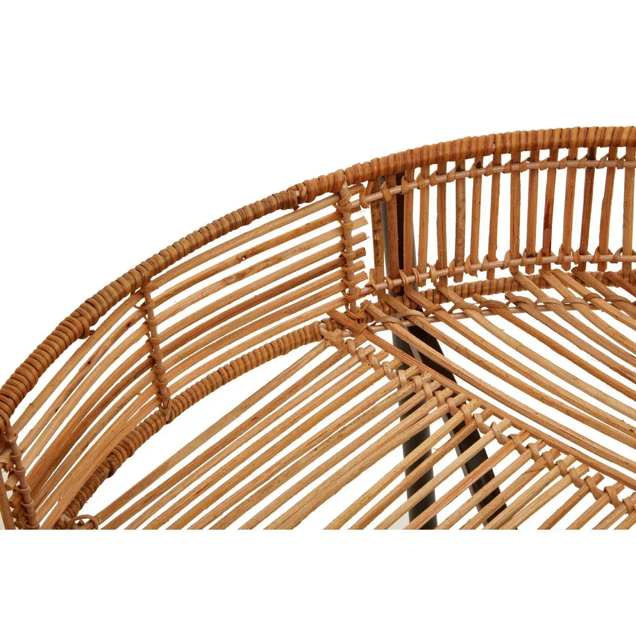 Closeup of natural rattan chair seat and backrest with woven detail and curved frame