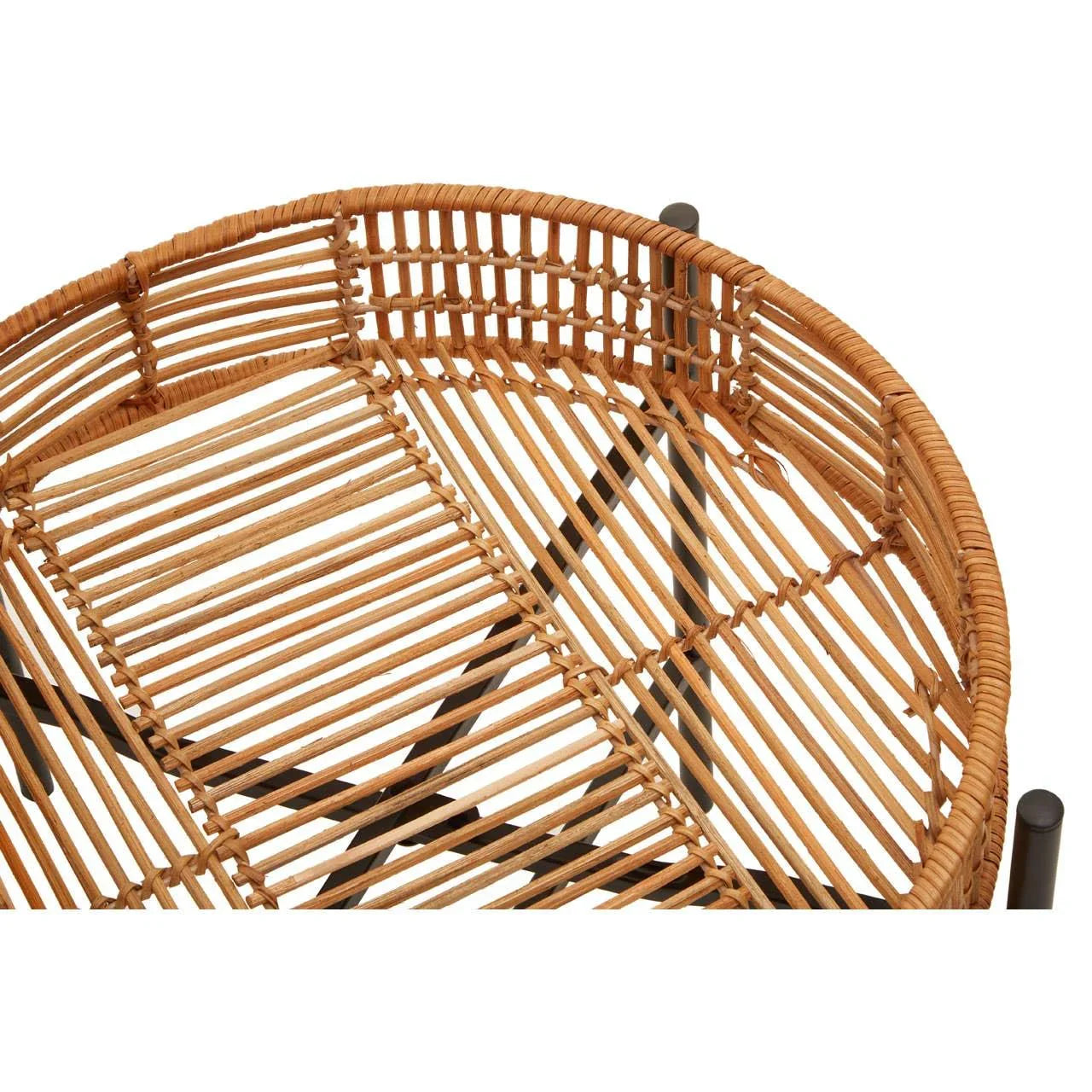 Round rattan side table with woven top and black metal legs, closeup of detail