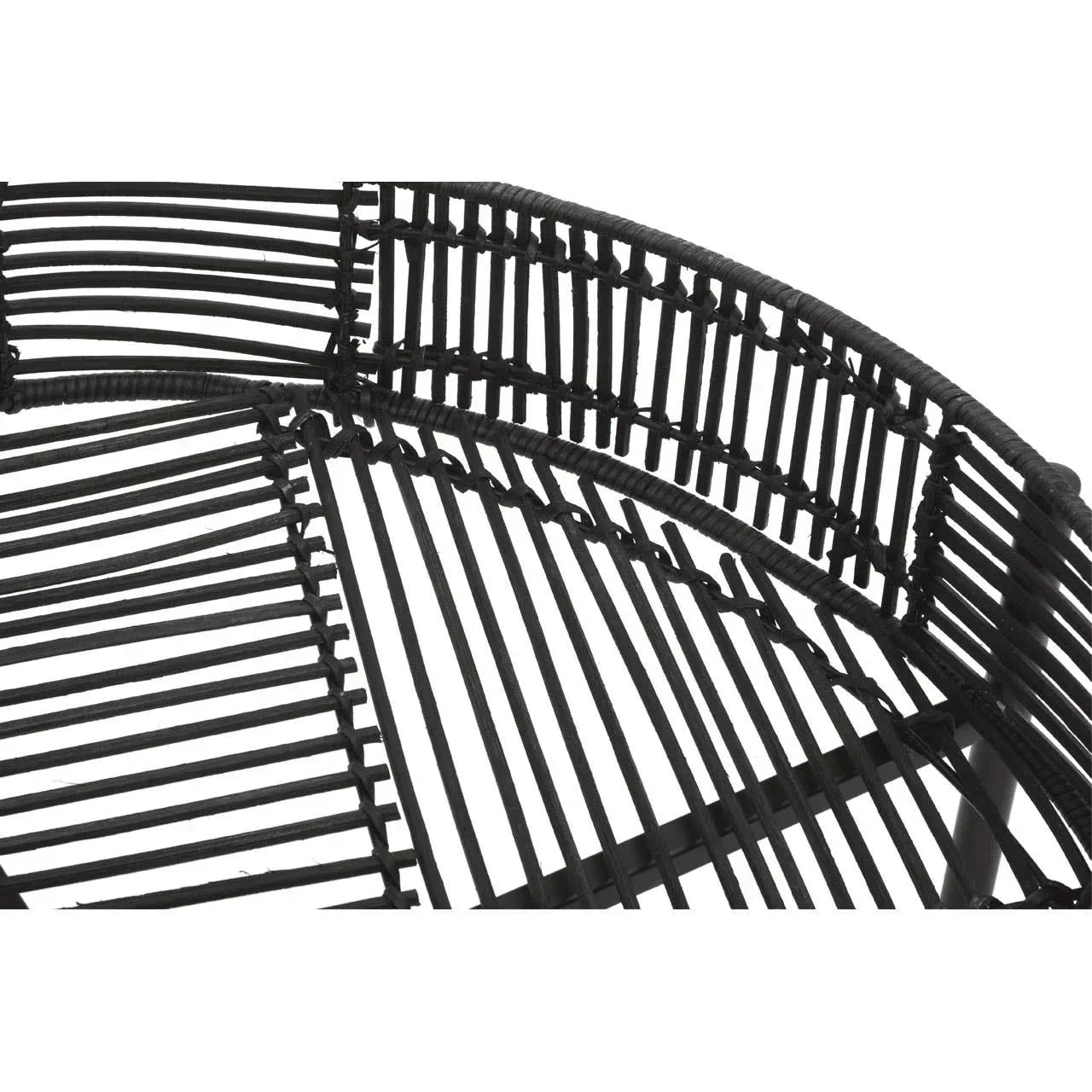 Close-up of black rattan chair frame detailing with curved backrest