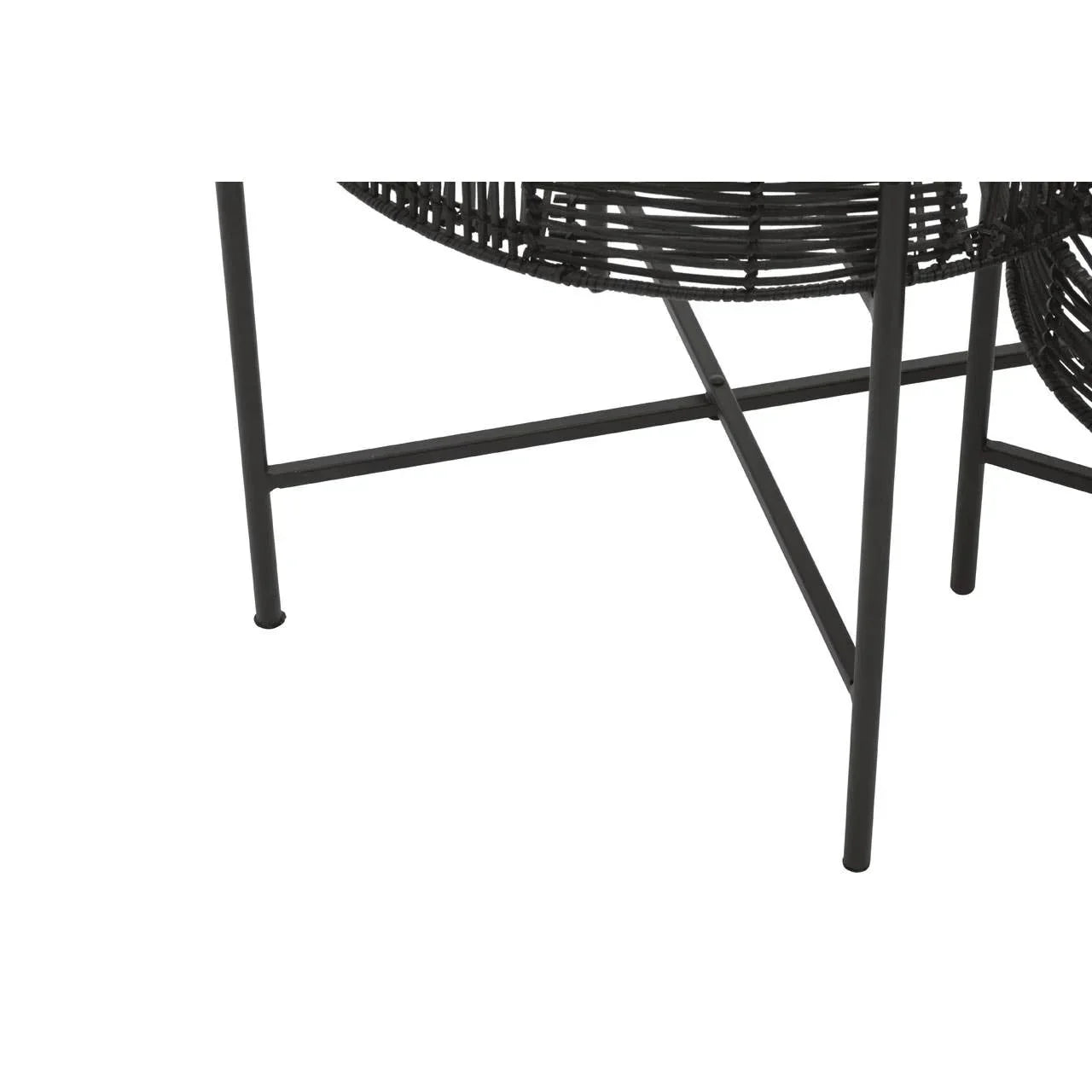 Black metal chair legs with woven rattan seat detail and crossbar support