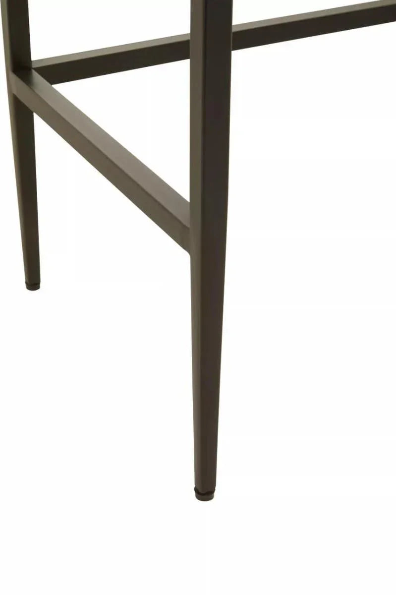 Close-up of metal furniture legs and crossbar support in matte brown finish