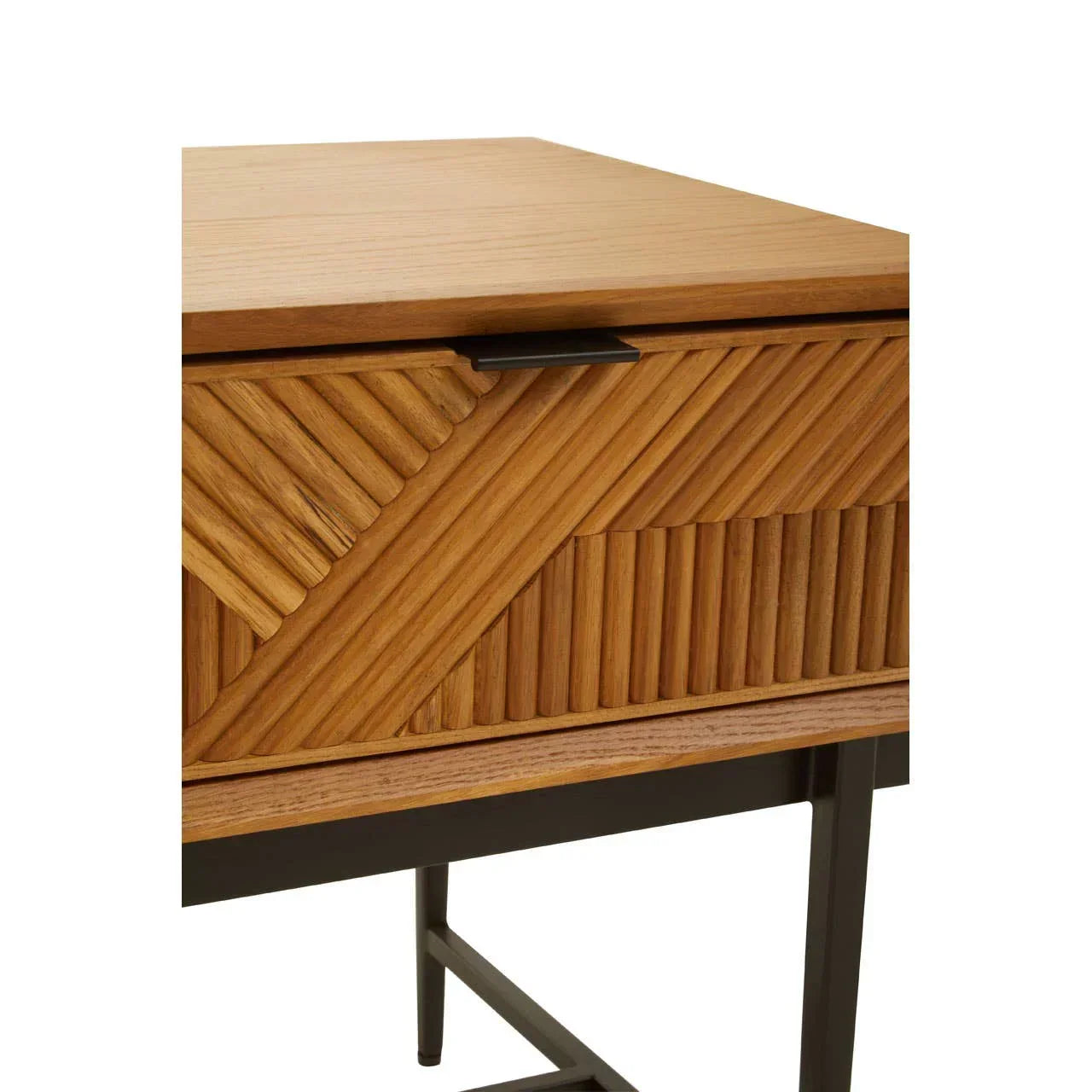 Close-up of wooden side table with textured geometric drawer front and black metal legs