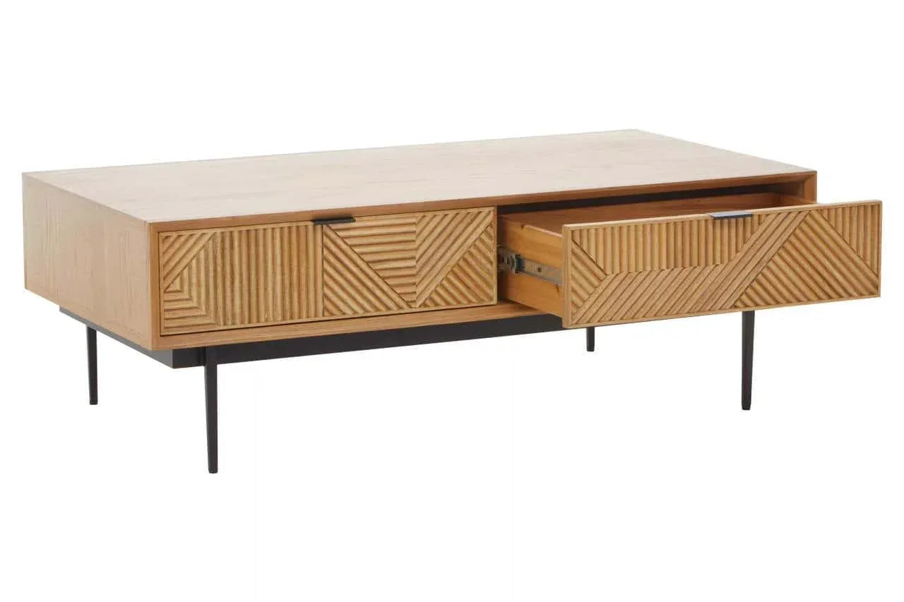 Wooden coffee table with geometric carved drawers and metal legs, one drawer open