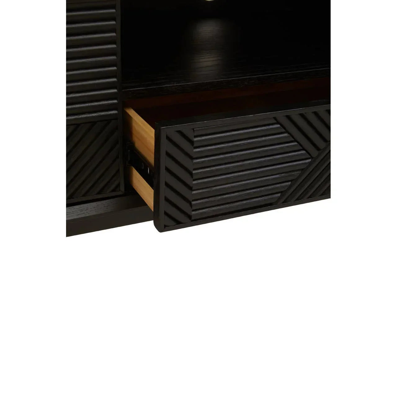 Close-up of black wood sideboard drawer with textured geometric front panel