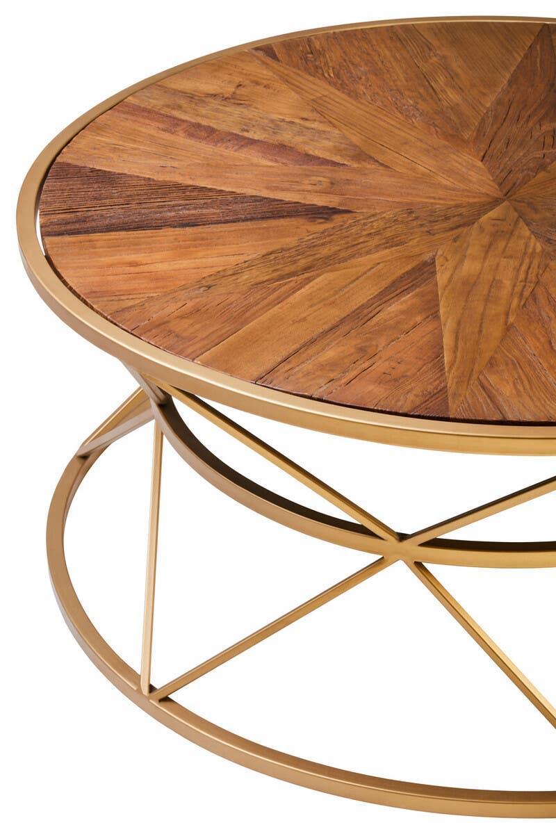 Round wooden coffee table with gold metal frame and geometric inlay design