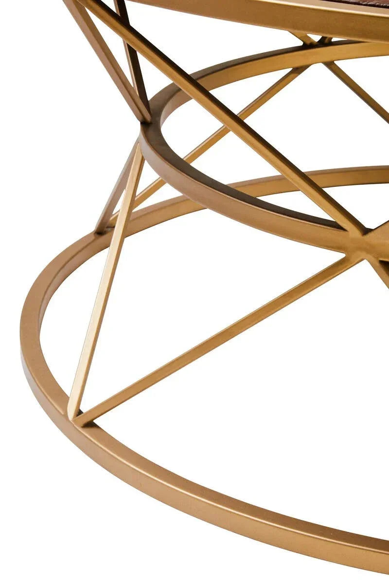 Gold metal coffee table base with geometric circular design detail