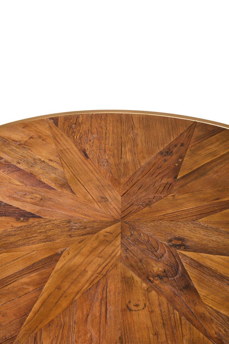 Round wooden dining table top with starburst pattern and natural wood grain finish