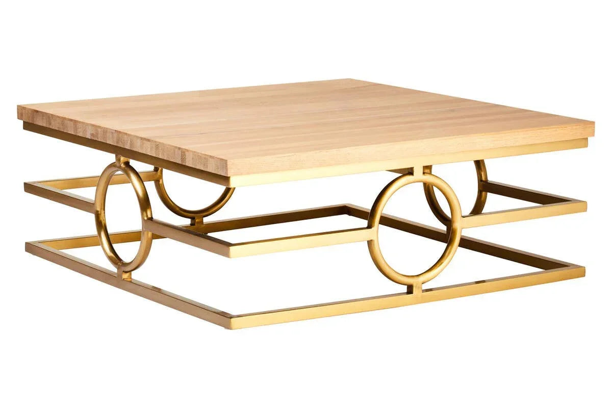 Square coffee table with light wood top and geometric gold metal base