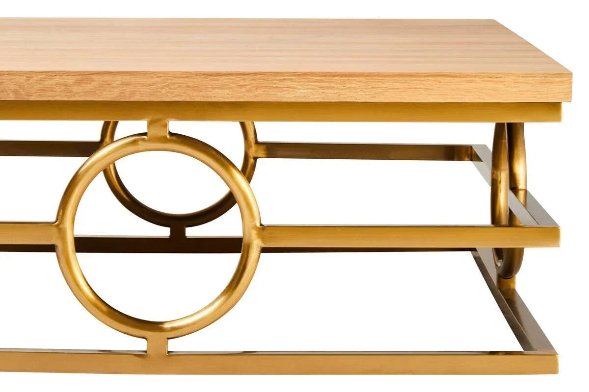 Rectangular coffee table with light wood top and gold geometric metal frame