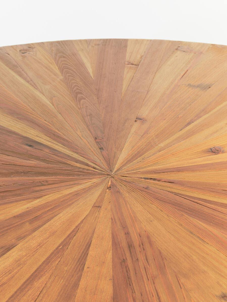 Round wood dining table top with sunburst pattern and natural finish