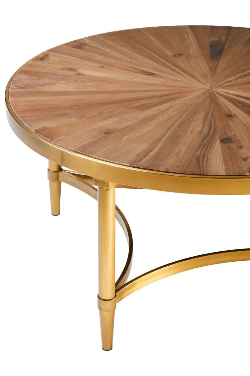 Round coffee table with wooden top and gold metal legs, close-up on tabletop and frame