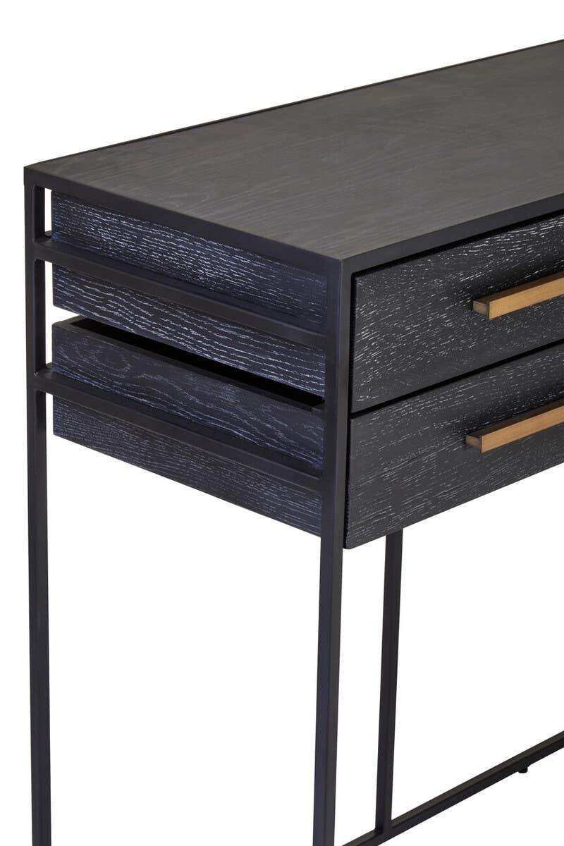 Black wood console table with slim metal frame and two drawers, angled view