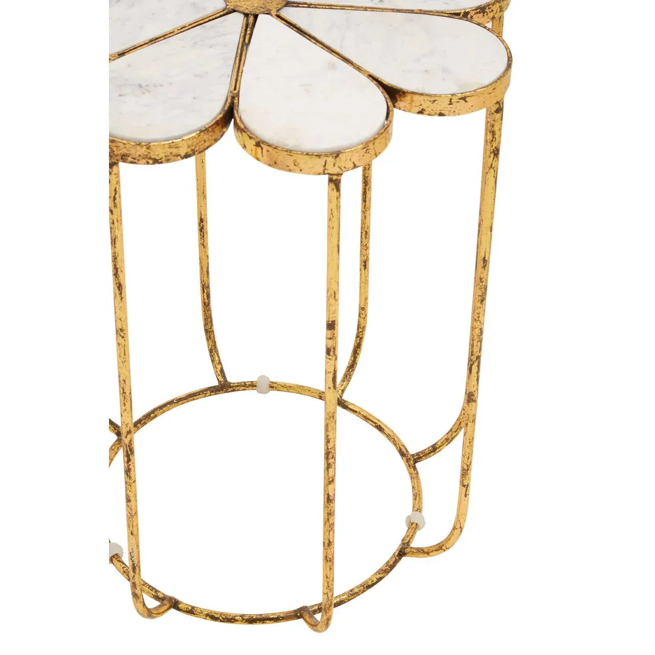 Gold metal side table with white marble top, floral petal design, close-up view