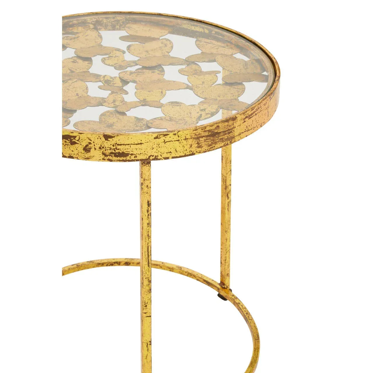 Gold metal side table with round glass top and leaf motif pattern