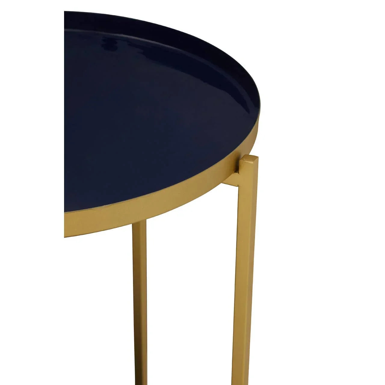 Round navy blue metal side table with gold legs, close view of tabletop and frame
