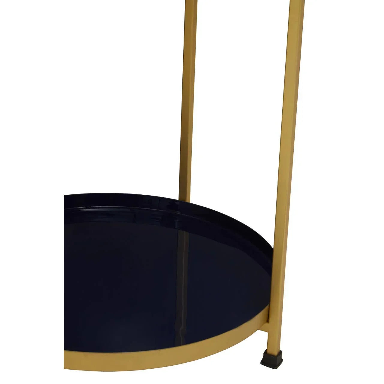 Close-up of gold metal side table legs with navy blue round lower shelf