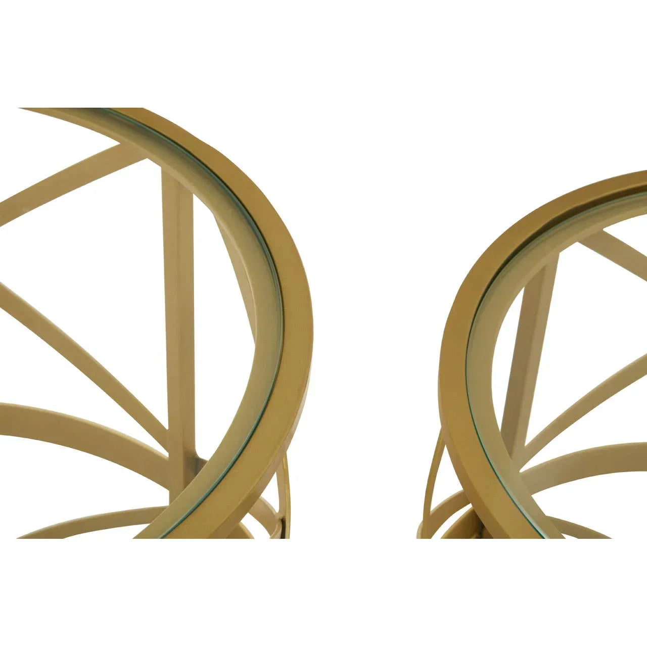 Closeup of gold metal frame and glass top on modern round side tables