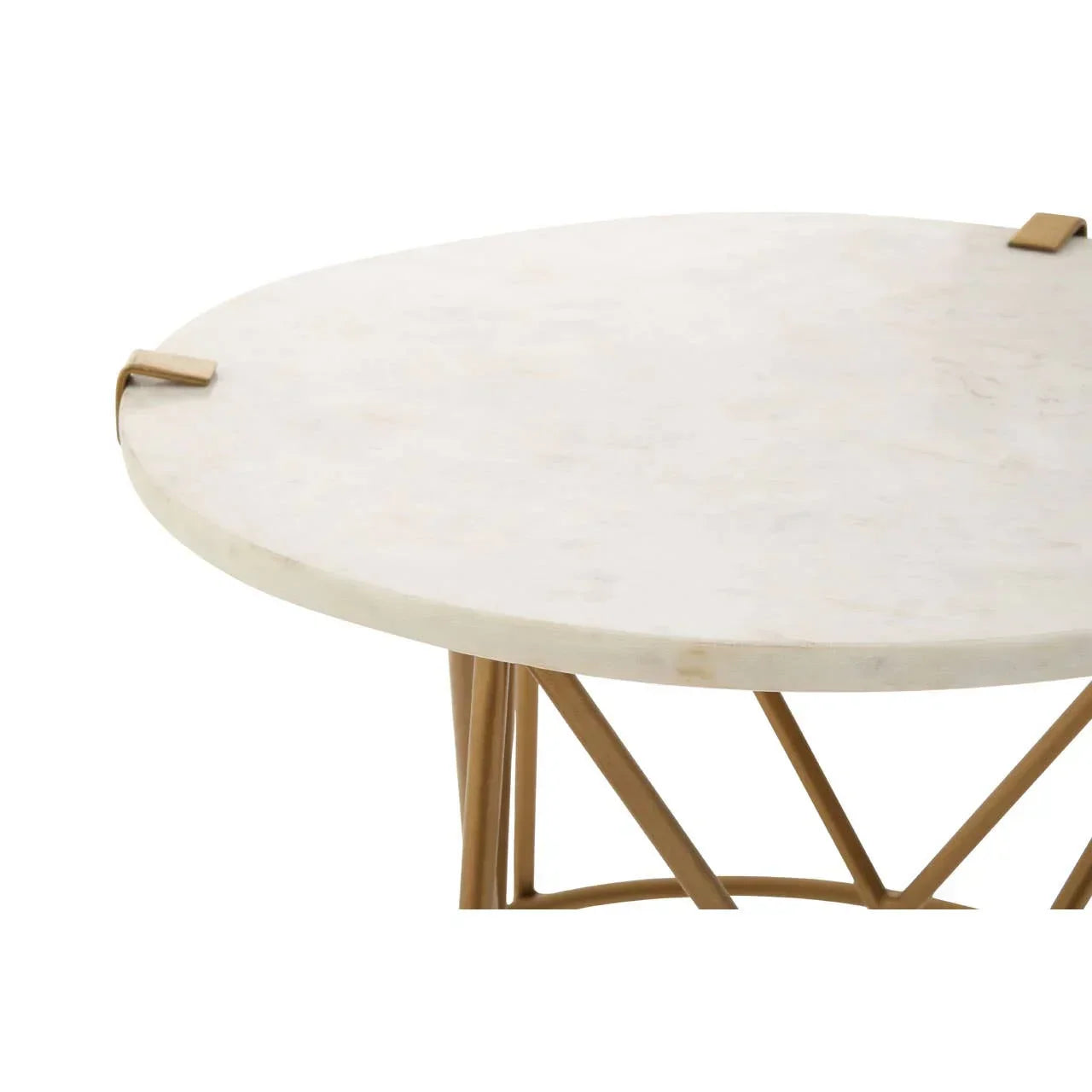 Round marble coffee table with gold metal legs, close view of smooth tabletop