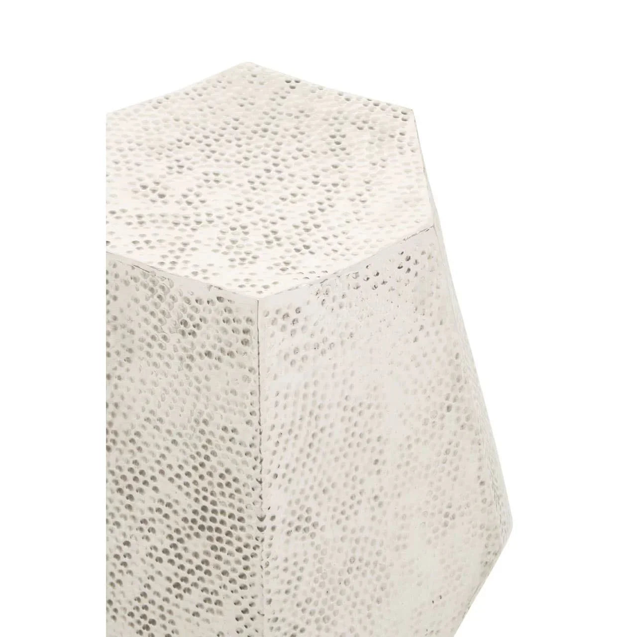 Hexagonal hammered metal side table in silver finish, close view of top and texture