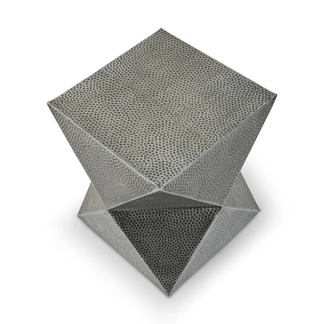 Geometric metal side table with textured silver finish and sculpted base