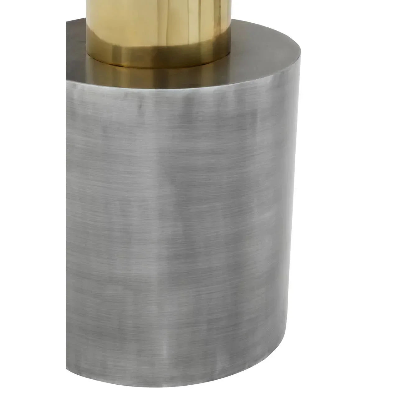 Brushed metal table base with cylindrical gold and silver finishes, close-up detail