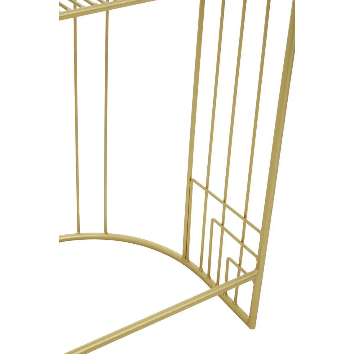 Gold metal frame detail of a geometric furniture base, showing modern design lines
