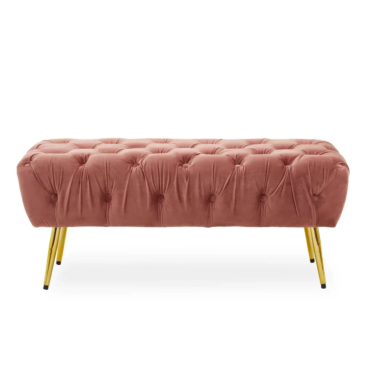Pink velvet bench with tufted seat and gold metal legs, front view