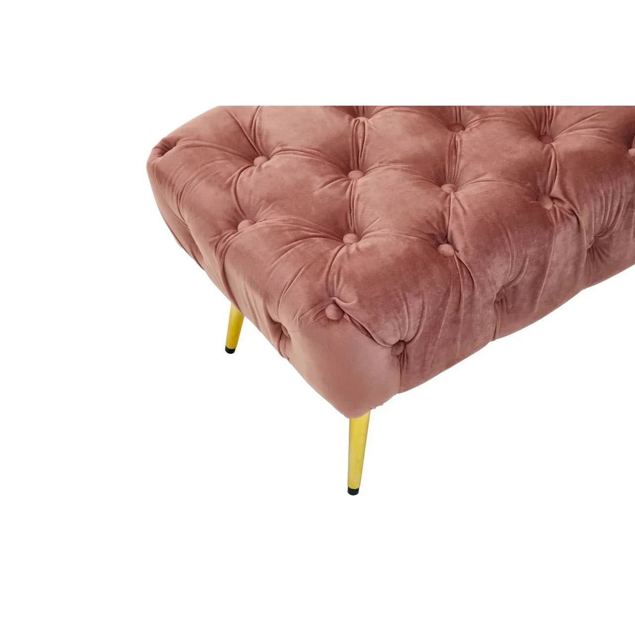Pink velvet ottoman with deep button tufting and light wooden legs, close-up corner view