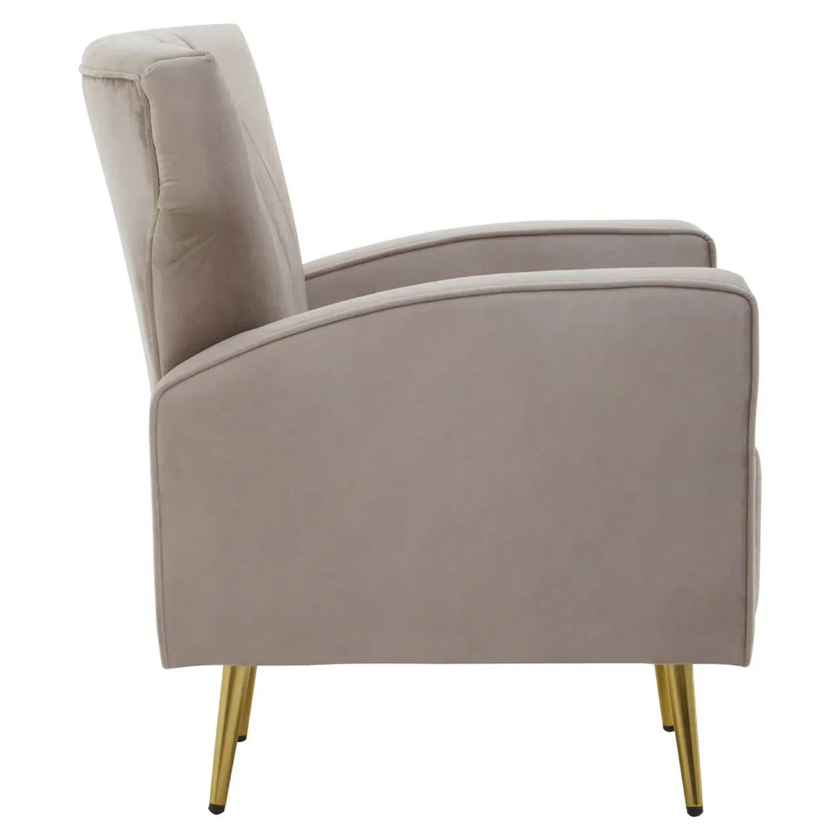 Side view of beige velvet armchair with slim gold legs and curved armrest