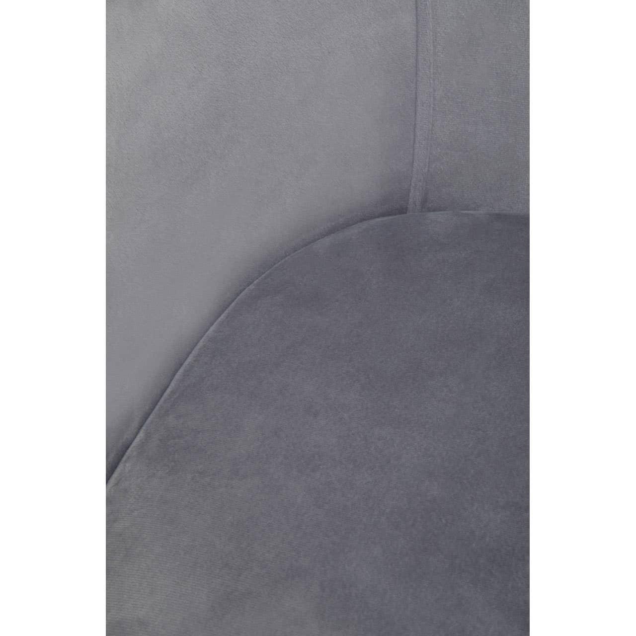 Close-up of grey velvet armchair fabric and stitching detail