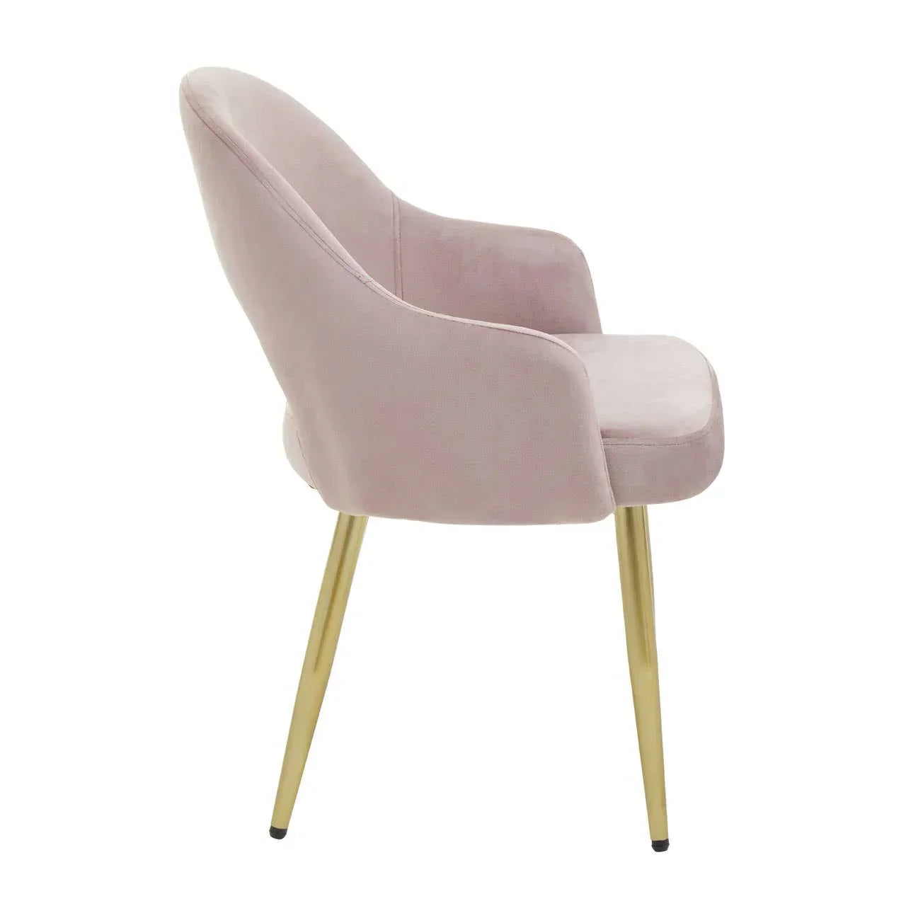 Pink velvet dining chair with gold metal legs, side profile view