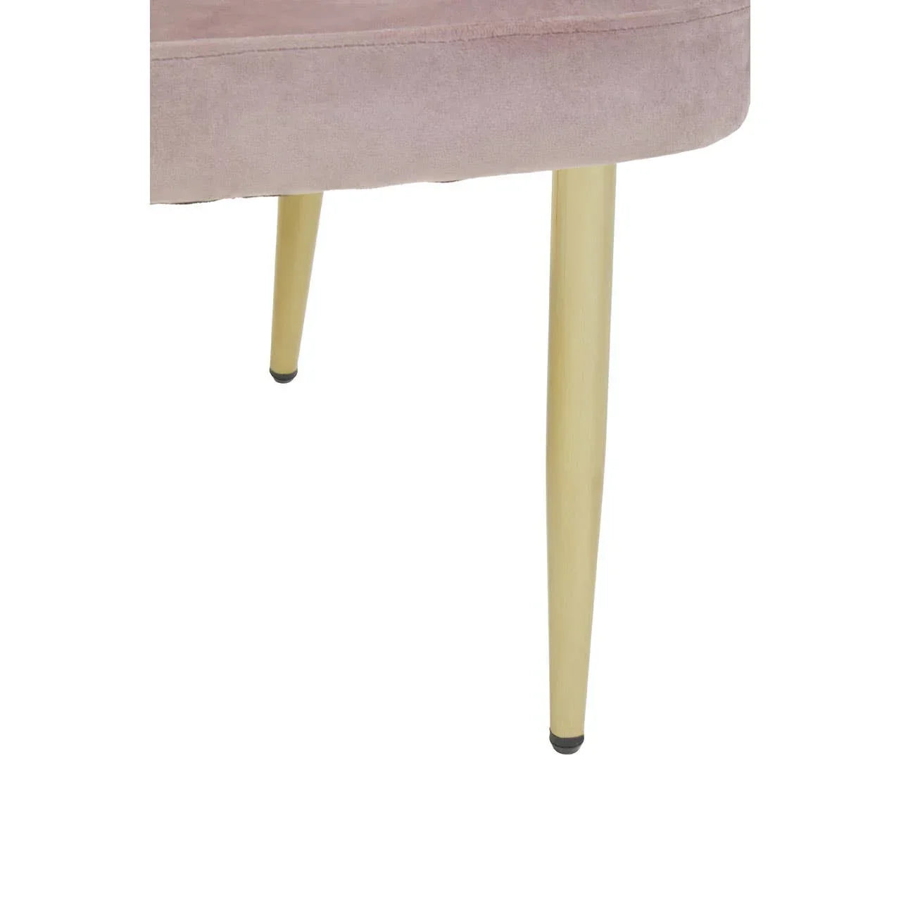 Blush velvet dining chair with gold metal legs, close-up on seat and front two legs