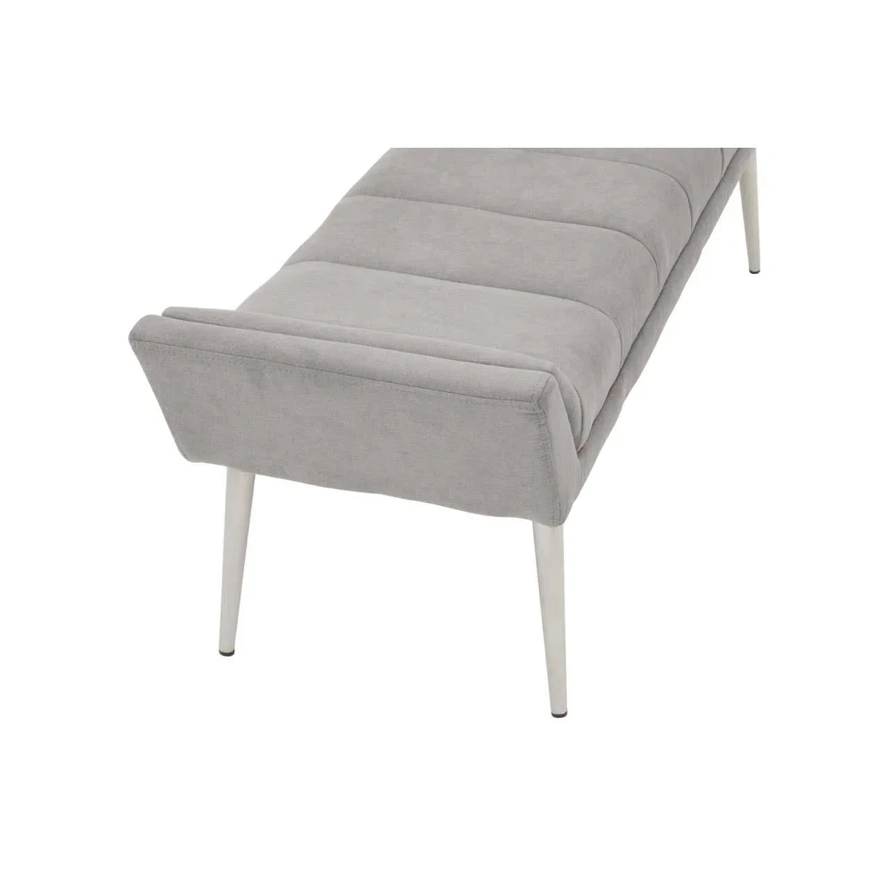 Light grey upholstered bench with metal legs and channel stitching, angled side view