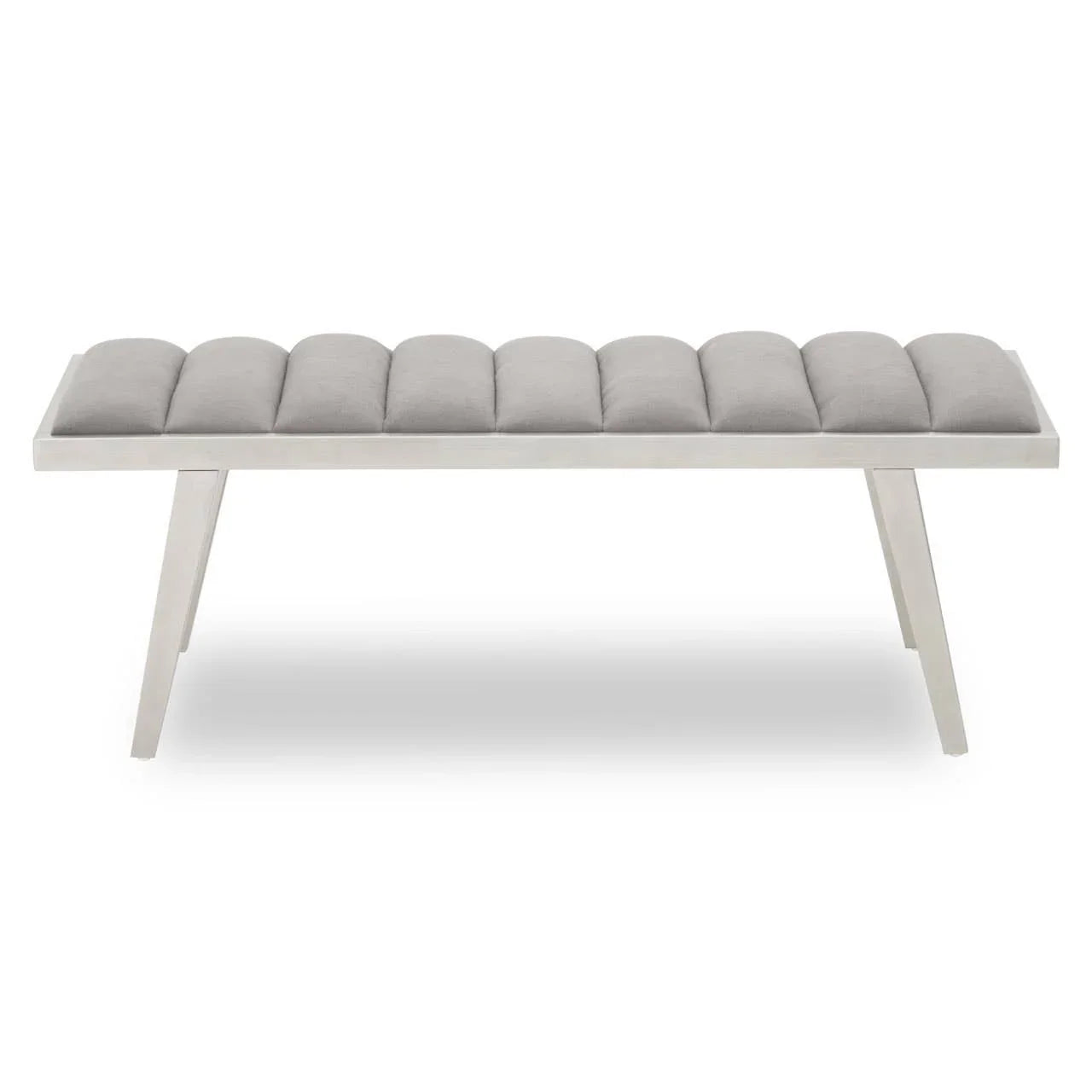Grey upholstered bench with channel tufting and angled wooden legs, front view